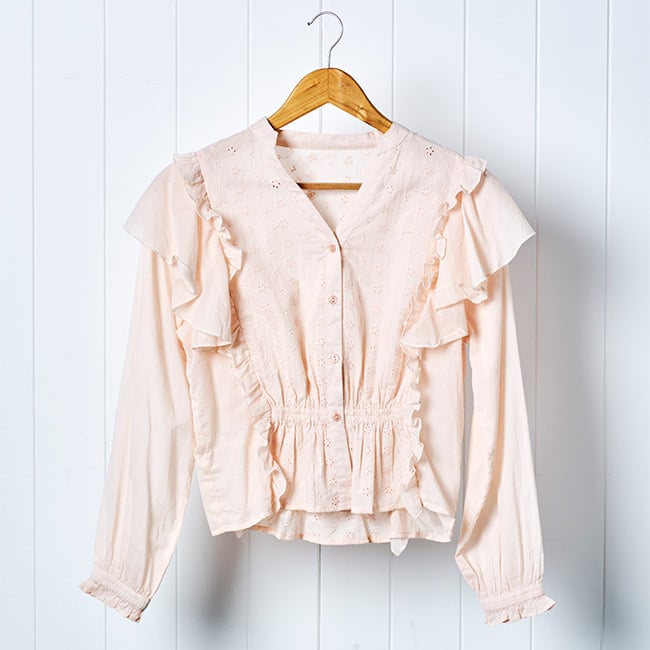 pink blouse with frills