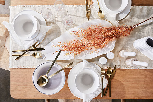 white tableware on brown table